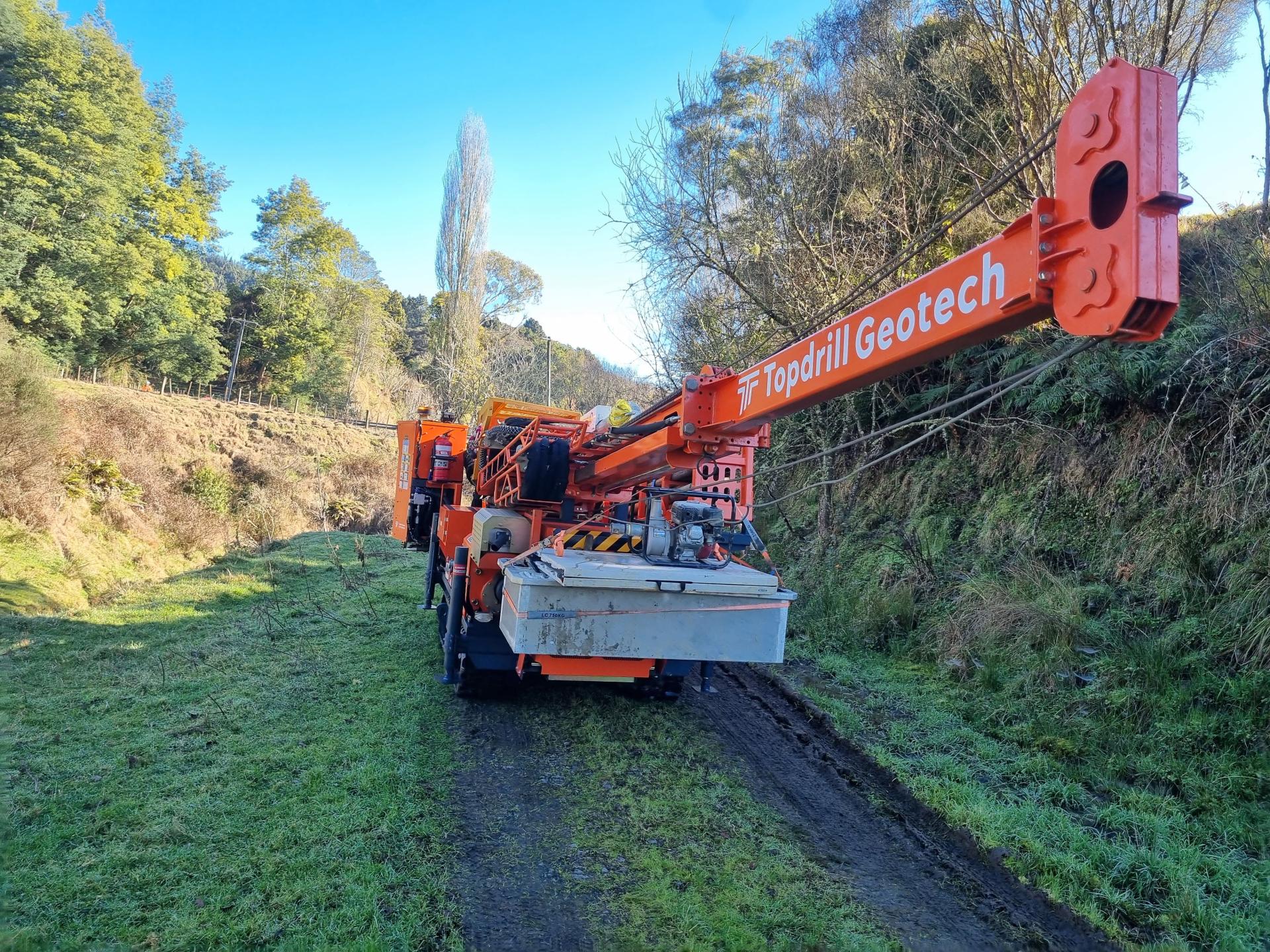 Borehole drilling machine driving to site