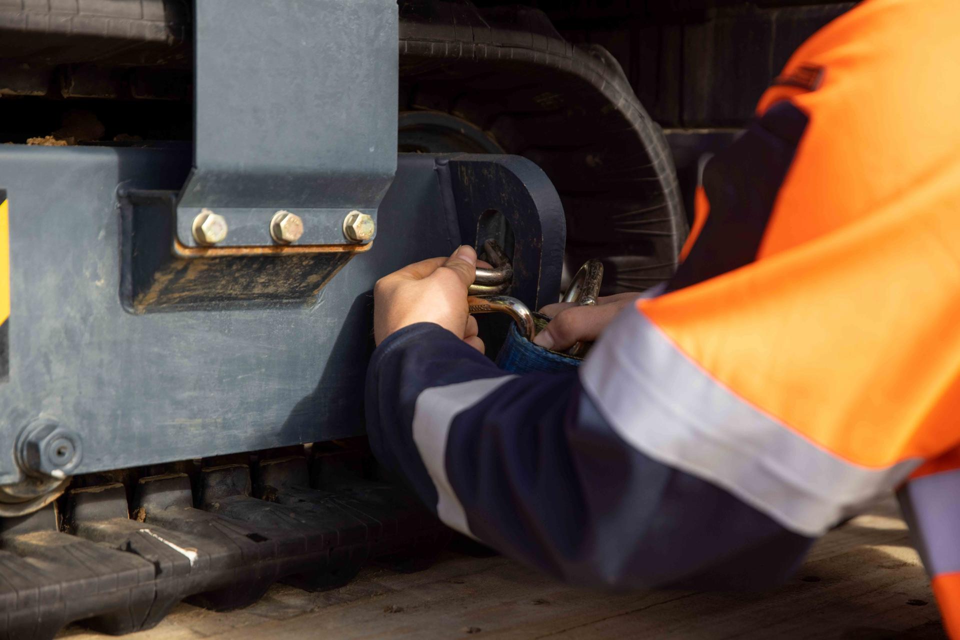 Close up shot of man setting up machine